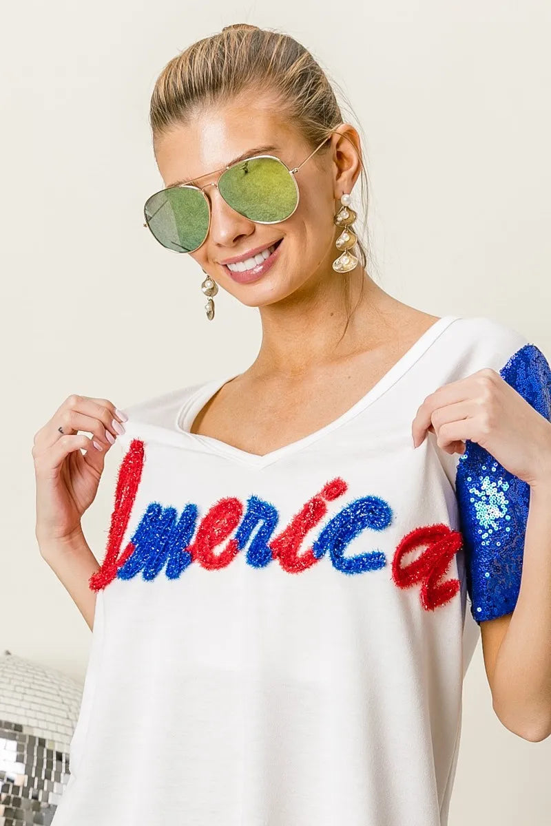 BiBi Metallic Letter V-neck Sequin Sleeves Top in Cream