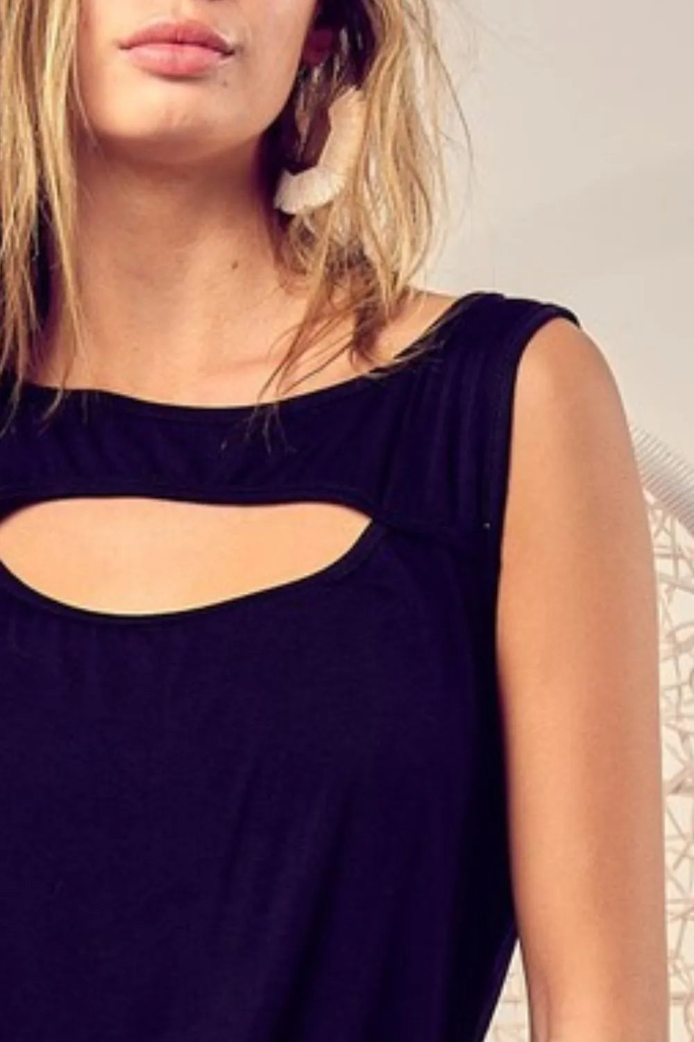 BiBi Rayon Span Knit With Cut Out Front Sleeveless Top in Black