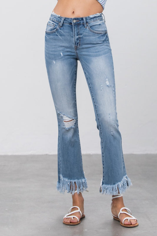 MID RISE LONG BOTTOM FRAYED CROP FLARE