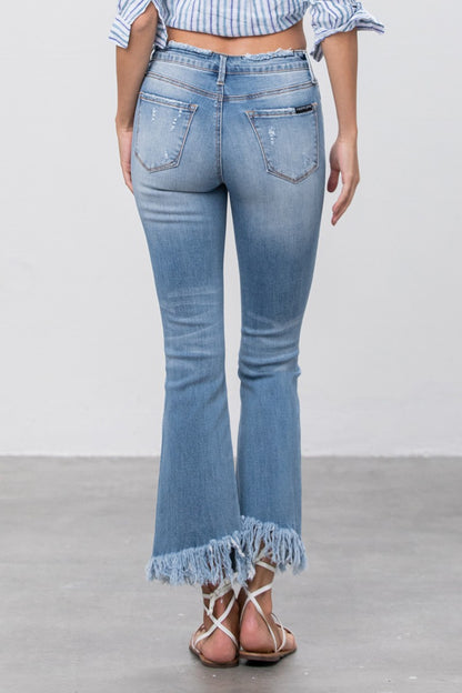 MID RISE LONG BOTTOM FRAYED CROP FLARE