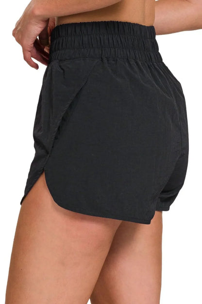 Zenana Windbreaker Smocked Waistband Running Shorts in Black